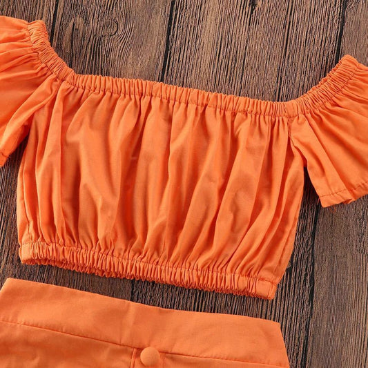 Girl orange skirt suit
